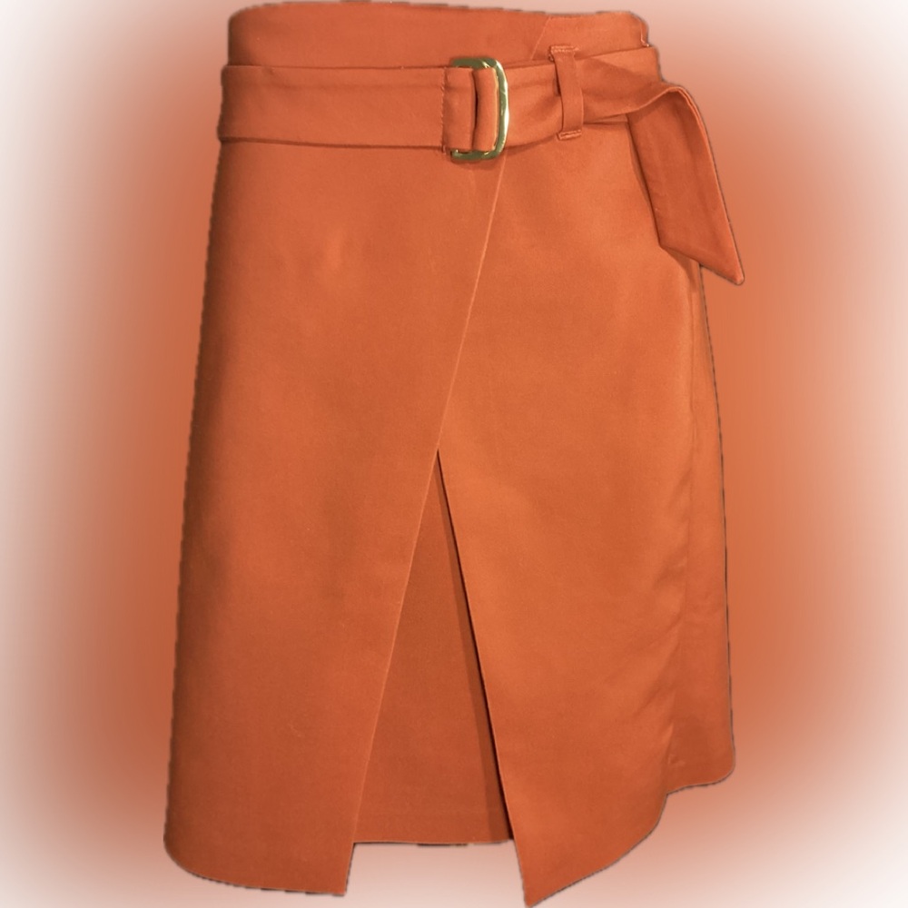 White/Black house market burnt orange skirt with open front and belt. Size 10
